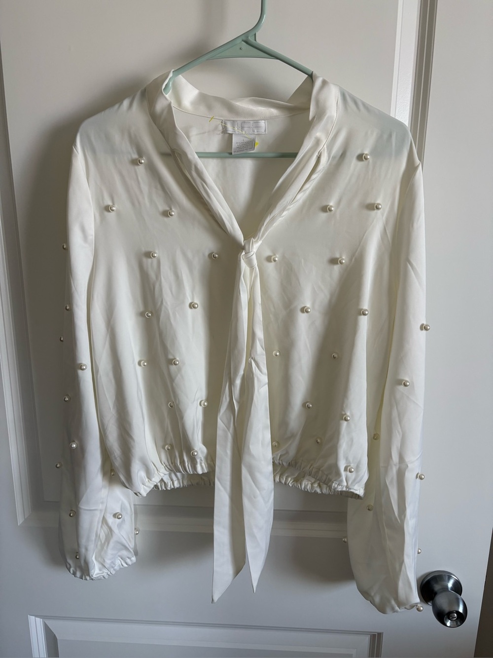 LIFE pearl embellished blouse